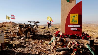 epa06116879 A monument to the martyrs of Hezbollah in a military position of Hezbollah in a mountainous area in Juroud of Arsal at the Lebanese -Syrian border 29 July 2017. A tour for Lebanese and foreign media at the liberated positions of Al-Nusra terrorist group , guided by the media office of Hezbollah, shows their fighters along the border with Syria. A ceasefire deal has been reached, that will see Al-Nusra fighters withdraw from the Syria-Lebanon border to Idlib province in Syria , a top Lebanese official said on July 27 after a week-long of military operation there by the Hezbollah movement. EPA/Nabil Mounzer