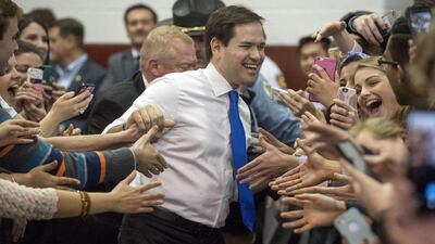 Republican presidential candidate Marco Rubio, greets supporters as he enters a rally at Roanoke College’s Bast Center in Salem, Virginia. Don Petersen / Roanoke Times via AP Photo