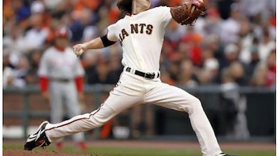 Pitcher Tim Lincecum, is one of several larger-than-life personalities at the San Francisco Giants, winners of the World Series. Danny Moloshok / Reuters
