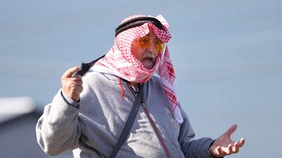 A man speaks to a reporter outside the Masjid-E-Bilal mosque in Glen Eden, which is under armed police guard in Auckland, New Zealand. Getty Images