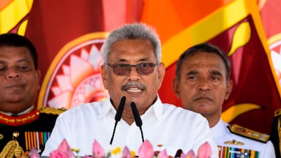 Sri Lanka's new president Gotabaya Rajapaksa, centre, was sworn in today at the Ruwanwelisaya temple in Anuradhapura. Lakruwan Wanniarachchi / AFP