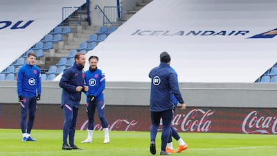 England manager Gareth Southgate with Jack Grealish during training. Reuters
