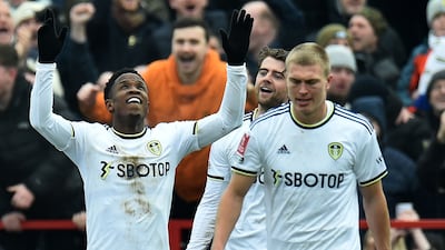 Leeds United's Luis Sinisterra (L) celebrates scoring the third goal in the 3-1 FA Cup fourth round win against Accrington Stanley at the Wham Stadium in Accrington on January 28, 2023. AFP