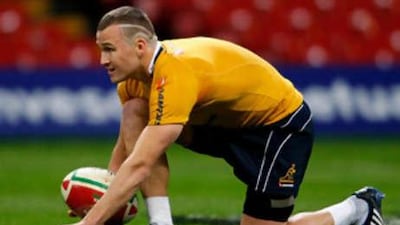 The Australia fly-half Matt Giteau practices his kicking before the game against Wales at Cardiff's Millennium Stadium last weekend.