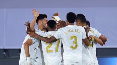 Real Madrid players celebrate the second goal. EPA