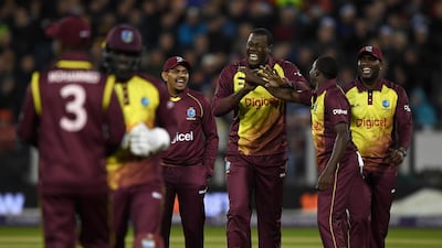 West Indies captain Carlos Brathwaite, centre, celebates dismissing Jonny Bairstow of England at Chester-le-Street. Gareth Copley / Getty Images