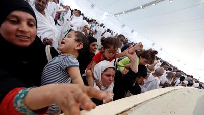Pilgrims walk on roads as they head to cast stones at pillars symbolising Satan during the annual Haj pilgrimage in Mina, near the holy city of Mecca, Saudi Arabia. Ahmed Jadallah / Reuters