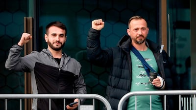 Survivors of the twin mosque shootings react as they arrive at Christchurch High Court for the sentencing hearing of Brenton Tarrant, in Christchurch. AFP