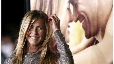 Jennifer Aniston and her rom-com avatars could take on Hollywood heartthrobs and find love. Matt Sayles / AP Photo