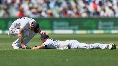 England captain Ben Stokes consoles Brydon Carse after dropping Australia's Alex Carey. AP