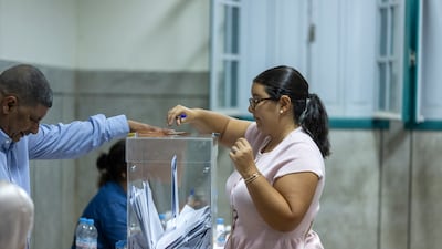 A woman casts her vote at a polling station in Rabat, Morocco. EPA