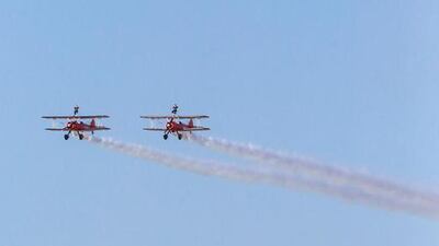 The manoeuvres include loops, rolls, and stall turns. During all of this, the wingwalkers experience speeds of up to 150 mph and G force of up to 4G. Victor Besa for The National