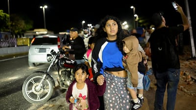 A woman and children in Caracas. Reuters