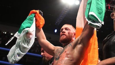 Conor McGregor celebrates after defeating Nate Diaz at UFC 202. AP