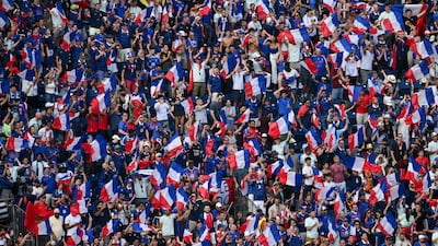 French fans celebrate after their team's 2-0 quarter-final victory over Morocco at Boston Stadium in Foxborough. AFP