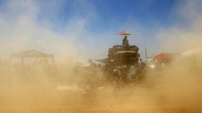 Spectators attend the first stage of the 2015 Dakar Rally in Buenos Aires, Argentina, on Sunday. Felipe Trueba / EPA