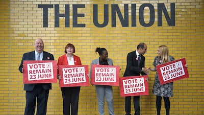 Above, Labour council leaders hold banners in favour of remaining in the EU at the Union building of Manchester Metropolitan University in Manchester. Oli Scarff / AFP