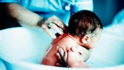 Post-natal doulas and midwives who do home visits can be a huge help for new mums. Getty Images