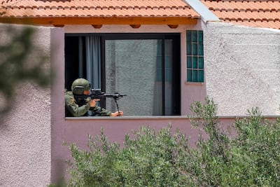 An Israeli soldier taking position at the border with Lebanon. AFP