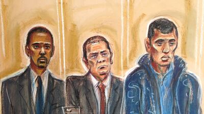 Defendents James Moss, left, Neofitos “Thomas” Efremi, centre, and Philip Spence during sentencing of their court case. The three are accused of attacking three Emirati sisters in a London hotel with a hammer. Priscilla Coleman / MB Media Solutions