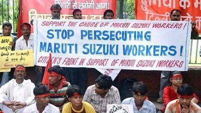 Sacked workers, trade unionists and family members of workers demanded that sacked workers be reinstated during a protest in New Delhi yesterday. AFP