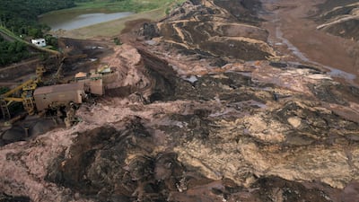 General view from above of a dam as rescue teams search for 200 people missing. Reuters