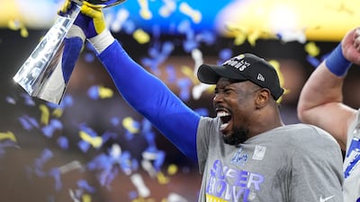 Los Angeles Rams outside linebacker Von Miller holds up the Lombardi Trophy. AP