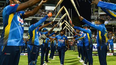 Here he is receiving a farewell from his teammates at the R Premadasa Stadium. Ishara S Kodikara / AFP