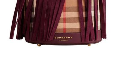 Burberry Bucket Bag in House Check and suede fringing. Courtesy of Burberry.