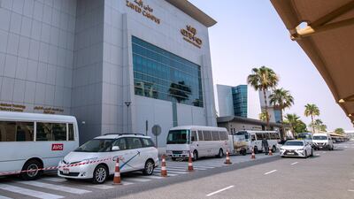 Etihad recruits wait for their bus outside the aviation training centre. Victor Besa / The National