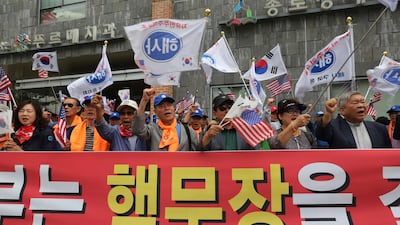 South Korean protesters rally to demand the deployment of nuclear weapons in South Korea near the presidential Blue House in Seoul, South Korea, on September 5, 2017. South Korean warships have conducted live-fire exercises at sea since Pyongyang said two days ago it had successfully tested a hydrogen bomb - the North's biggest-ever nuclear test. Ahn Young-joon/AP Photo