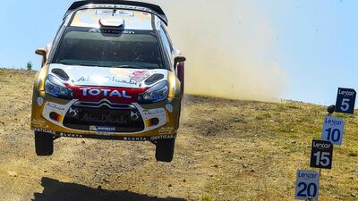 United Arab Emirates' driver Khalid Al Qassimi and co-pilot Chris Patterson in Sardinia on June 7, 2014. AFP