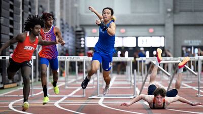 A nasty fall in the hurdles at the State Open indoor track championships in New Haven, Connecticut. AP