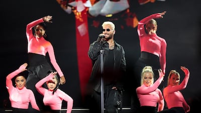 Maluma didn’t let up as he and his crew of dancers swept through a hip swivelling reggaeton set. Chris Whiteoak / The National