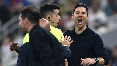 Real Madrid coach Xabi Alonso shouts at Atletico Madrid counterpart Diego Simeone during an angry exchange in the Spanish Super Cup semi-final on Thursday. AFP