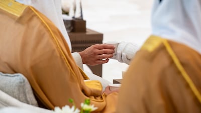 Arabic coffee is served at the event, which marked the first day of Eid Al Adha
