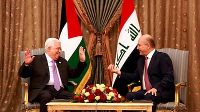 Iraqi President Barham Salih, right, meets with visiting Palestinian President Mahmoud Abbas at Salam Palace in Baghdad, Iraq, Monday, March 4, 2019. AP