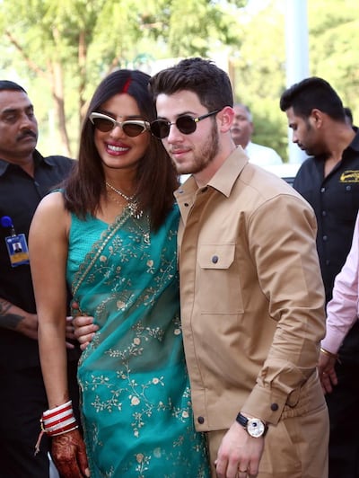 Priyanka Chopra and Nick Jonas pose for photographs in Jodhpur after their wedding ceremony. EPA