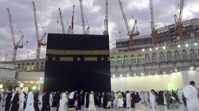 Construction cranes are seen as Muslims circle the Kaaba and pray during Umrah, at the Grand Mosque in Mecca on January 6, 2013. The area surrounding the Grand Mosque is currently undergoing an expansion to accommodate more pilgrims, according to local media. Reuters