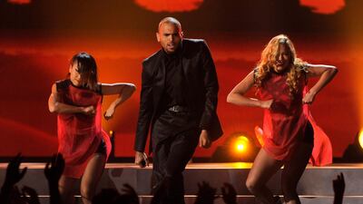 Chris Brown danced around the stage to his latest single, "Fine China," though his voice began to crack during the performance. Chris Pizzello / Invision / AP