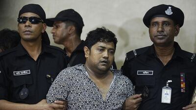 Bangladesh property tycoon Sohel Rana (centre) is among those charged over the Rana Plaza collapse. AFP