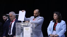 A voter casts his ballot in an election for the Syrian parliament in Hasakah. Reuters