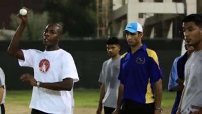 The UAE coach Vasbert Drakes takes a training session in Sharjah.