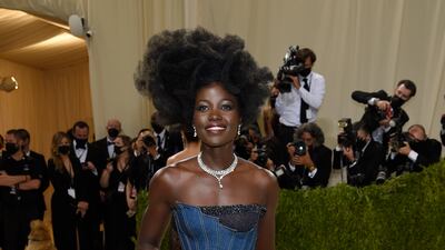 Lupita Nyong'o, donning Atelier Versace, attends the 2021 Met Gala. AP