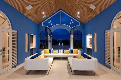 The villa has a blue and white colour scheme