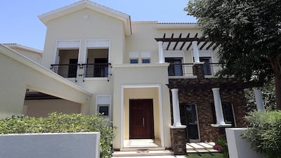 An exterior view of a four-bedroom Mediterranean villa at the Mohammed Bin Rashid District One development in Dubai. Satish Kumar / The National