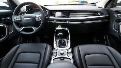 The wide, sweeping dash gives an illusion of space with its flowing design, and holds together the cockpit. Victor Besa / The National