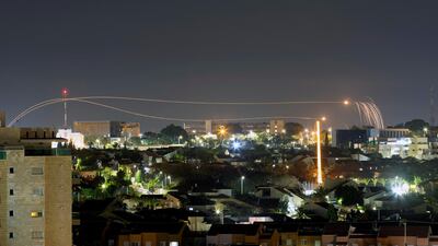 Iron Dome anti-missile system fires interception missiles as rockets are launched from Gaza towards Israel, as seen from the city of Ashqelon. Reuters