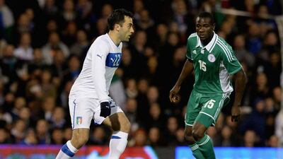 Giuseppe Rossi atempts to get around Solomon Kwambe on Monday night in Italy and Nigeria's 2-2 draw. Claudio Villa / Getty Images