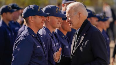 President Joe Biden greets members of the US Coast Guard stationed at Brant Point in Nantucket, Massachusetts, on Thursday. AP